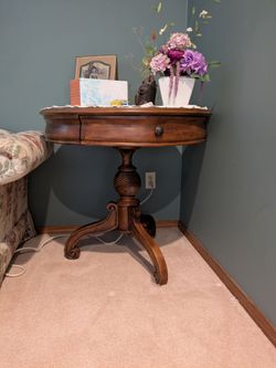 Eddie Bauer lane Cherry pedestal center table