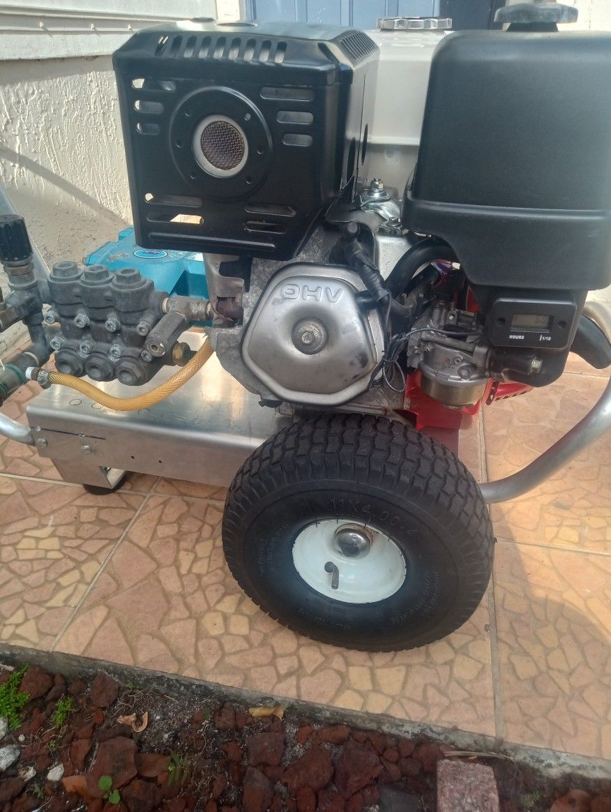 PRESSURE WASHER POWERED BY HONDA GX390 ENGINE WITH CAT PUMP 66DX; 4000 PSI @ 4 GPM
