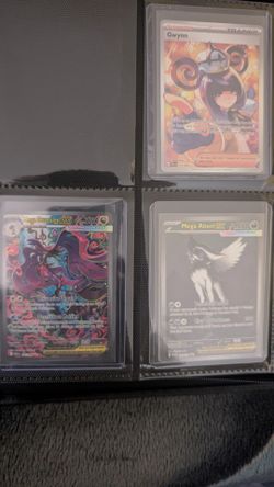 Pokemon Holo Cards in binder 76 Cards total.
