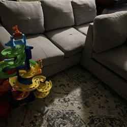 Beige L Shaped Sectional Set.