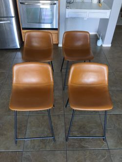 Set of 4 Mid-Century Modern Faux Leather Counter Stools.