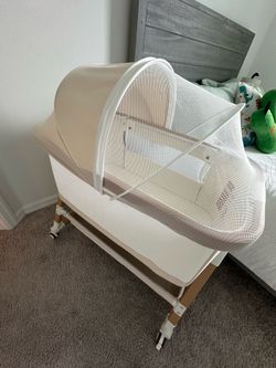 baby bassinet, never used, beige