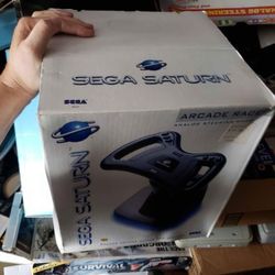 sega saturn arcade racer steering wheel. complete in box excellent new condition