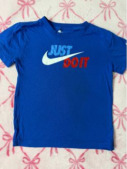 red white and blue nike shirt