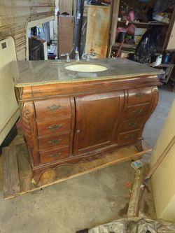 Sink With Wooden Cabinets