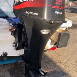 2003 Mercury 25 HP 4 stroke, complete power trim.  $1995 in excellent condition