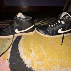 Air Jordan 1 Mid sneakers, black with sail/cream soles, US size 13