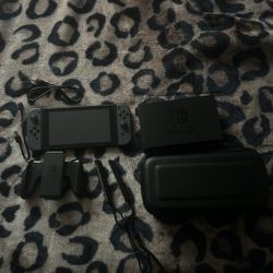Black Nintendo Switch With Grey Joycons