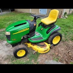 JOHN DEERE L120.  48" CUT. 20HP. RUNS GREAT.  900.00
