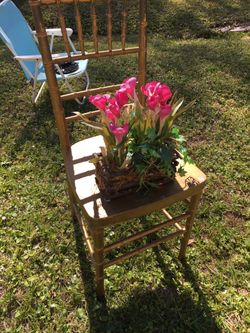 2 wooden golden color distressed chairs