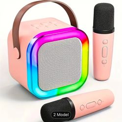 New In Box Speaker And 2 Microphones Bluetooth 