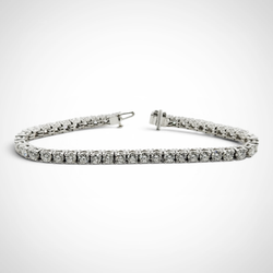 Ladies 9.00 Carat Platinum Tennis Bracelet with VS1 / E-F 44 Brilliant Round Diamonds - Total Weight 27.4 Grams. (Size 7.0")