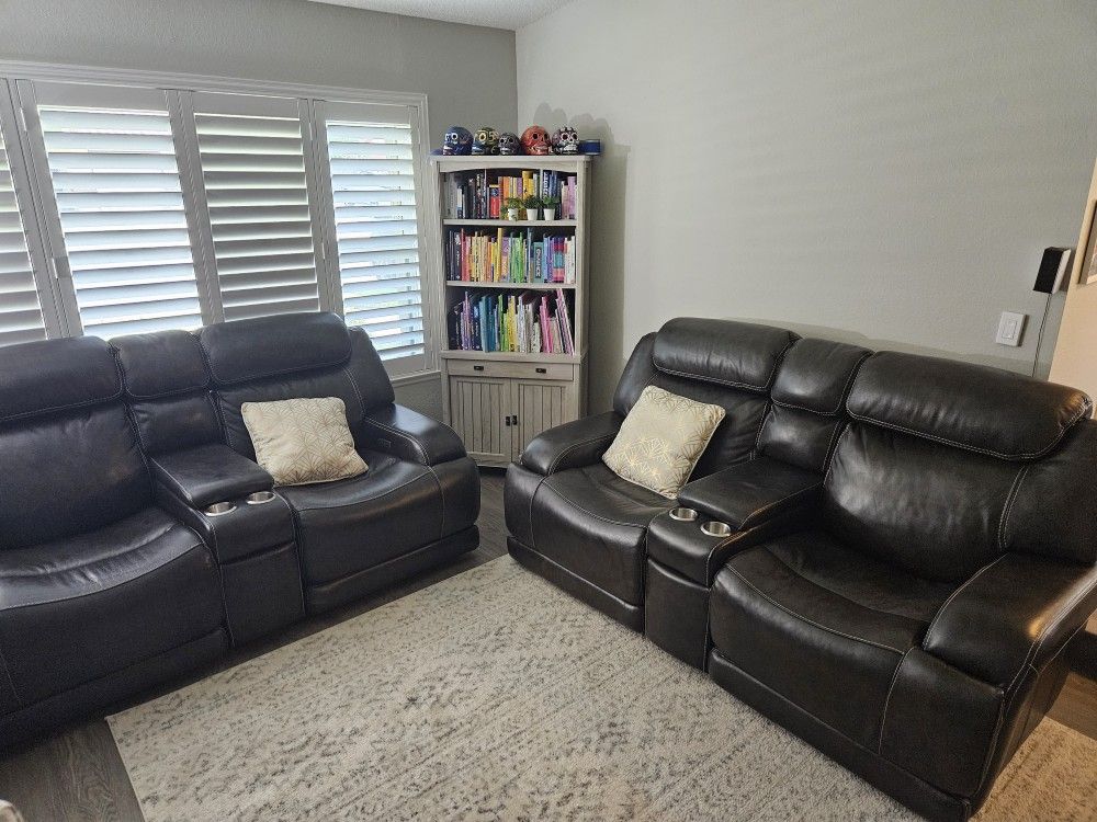 2 Leather Power Reclining Couches