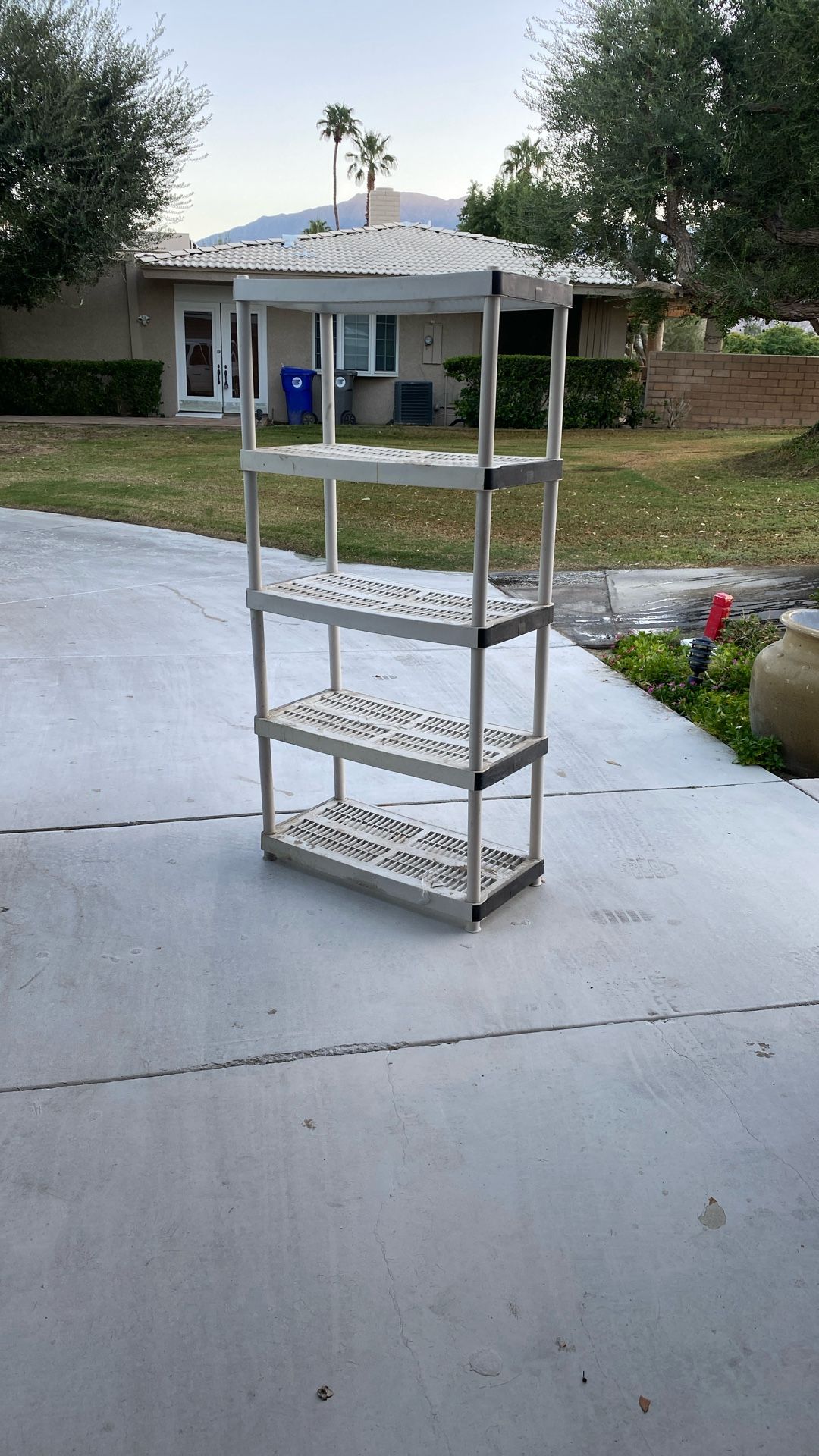 3 Plastic garage shelves 5 Or 6 feet tall 3 feet wide 18 inches deep. $25 each or all three for $50.