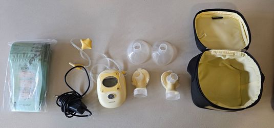 Medela breast pump and accessories