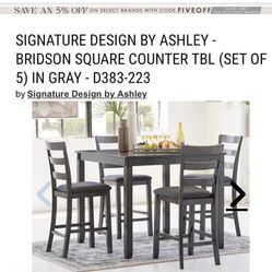 Ashley Furniture Table And Chairs
