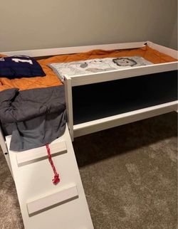 Twin bed with slide