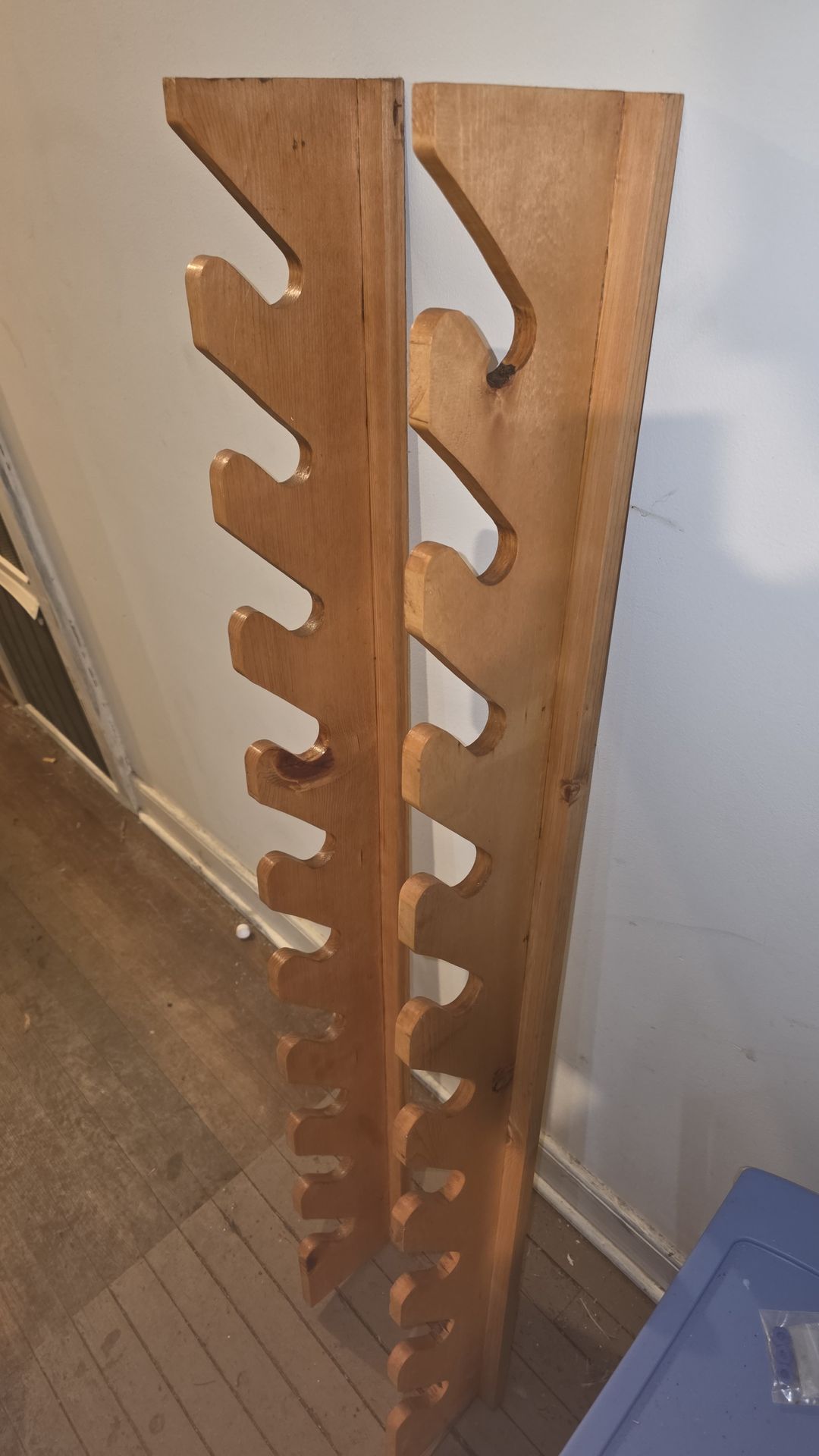 Wall mount fishing rod storage racks