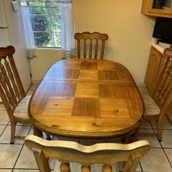 Dining Room Table and Set Of Chairs