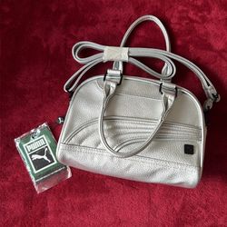 Crossbody Puma color silver con etiqueta nunca usada