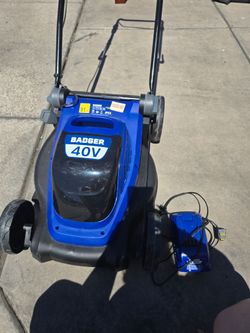 Cortadora de césped de batería con cargador nueva