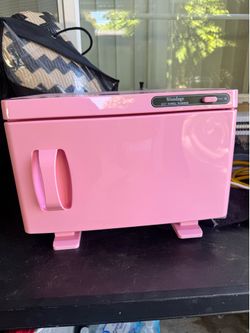 Pink towel warmer