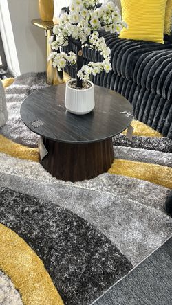 Black stone with dark brown wood coffee table