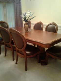 Dining room table with six chair it's almost new and China Buffet.