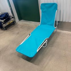 Foldable beach lounge chair.. $40