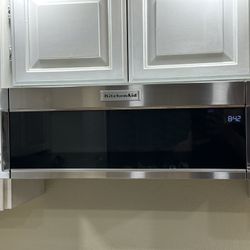 KitchenAid 1.1 cu. ft. Over the Range Low Profile Microwave Hood Combination (Model KMLS311HSS)