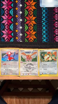 3 vintage Pokémon cards.