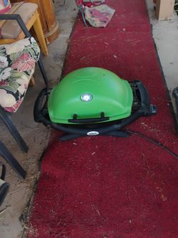 Gree webber portable grill with stand.