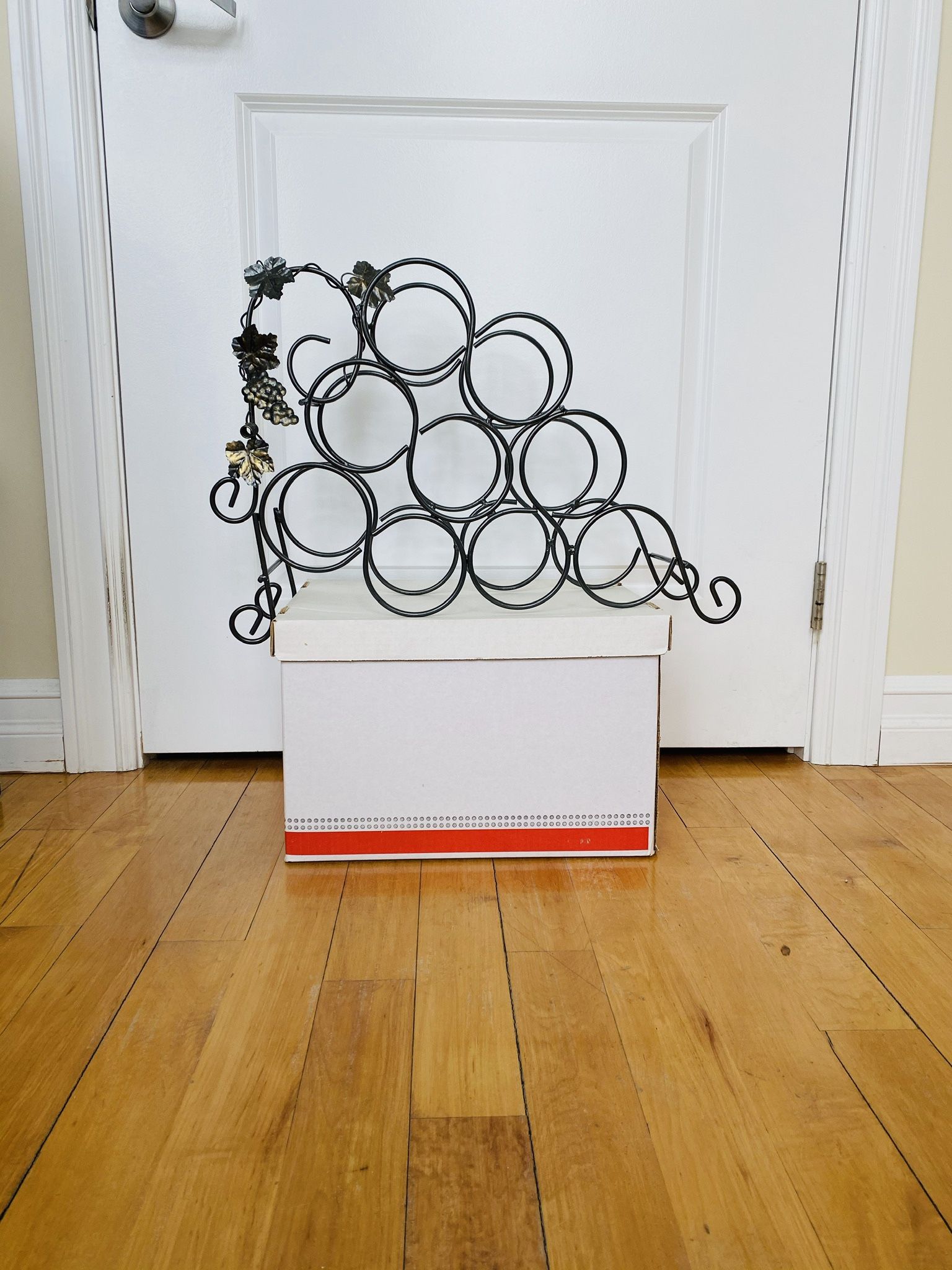 Antique Elegant Designer Wine Rack. Absolutely new. Never used. Nice decoration for your wine collection. Easily fits 9 bottles. High quality differen