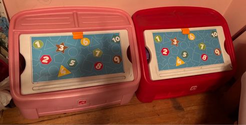 2 toy boxes with toys