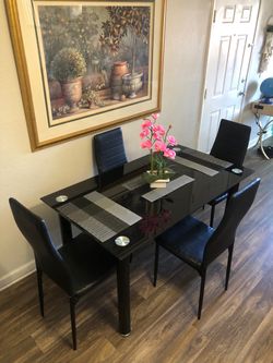 Black Glass dining table set with 4 leather chairs