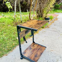 Wood C Shape End Side Table with Charging Station Outlet USB Ports Lockable Wheels New Condition Size Length 15", Width 12", Height 23" 