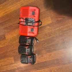 Milwaukee Rapid Charger And 3 Batteries 