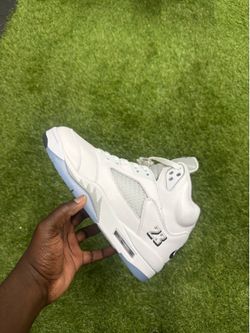 White metallic Jordan 4s