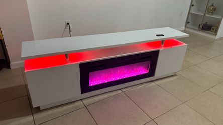 Tv stand with fire place