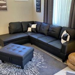 Black leather Sectional Couch And Ottoman