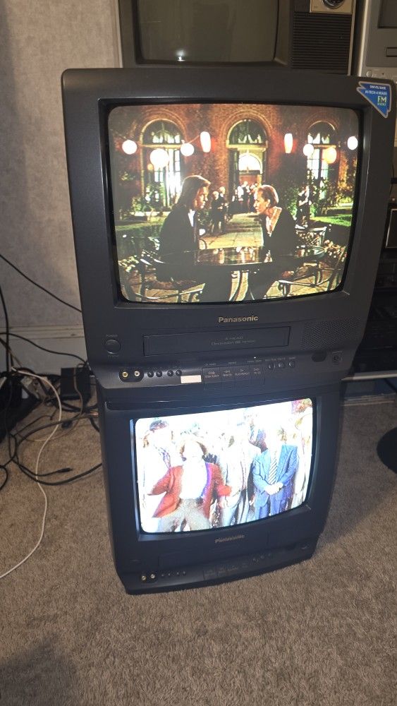 Two vintage Panasonic VCR Crt Televisions.