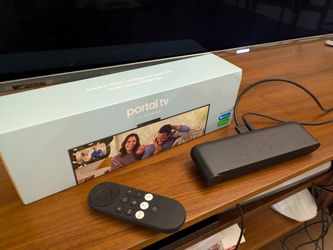 Portal TV from Meta/Facebook with original box, remote, and power adapter.