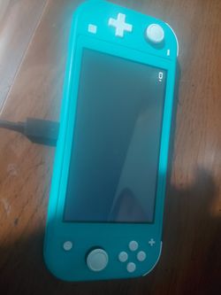 Nintendo switch BRAND NEW WITH GAME AND CHARGER