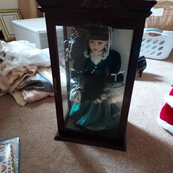 NEW IN CASE CAMELLIA GARDEN PORCELAIN DOLL. $10.00