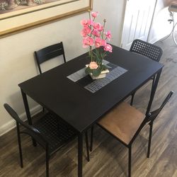 Like new black dining table set with 4 chairs