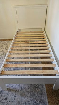 White Twin Bed with Tuft and Needle Matress