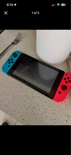 Nintendo Switch Console w/ Neon Red Blue Joy-Cons