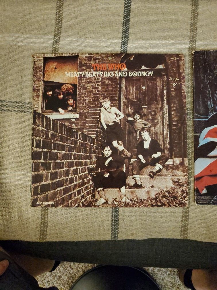 2 albums from The Who with Picture Book