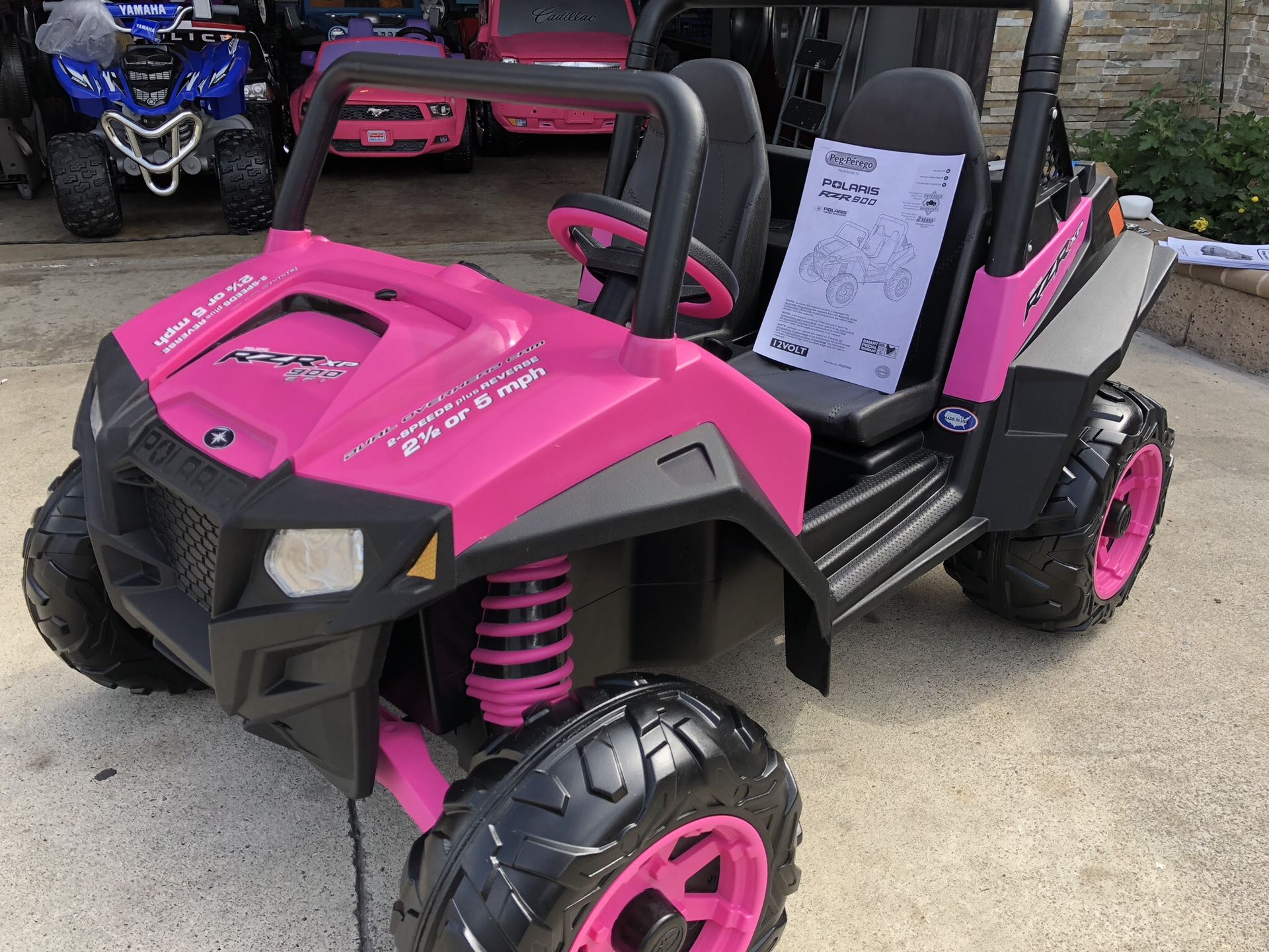 NEW CONDITION Pink Polaris Ranger RZR 12volt electric kids ride on cars power wheels