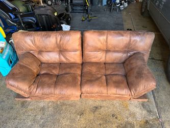 Brown loveseat in excellent condition. Very clean with no rips or major stains. Cushions are firm and comfortable. Includes all legs and hardware. Rea